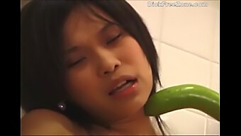 Petite Asian Teen Emma Cucumber Indulges In Self-Pleasure