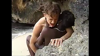 African Teen Rides A Big Dick On The Beach